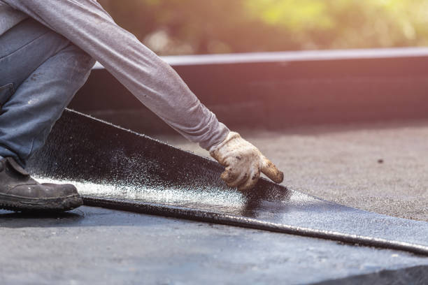 Professional Emergency Waterproofing technician working in Westmont, IL